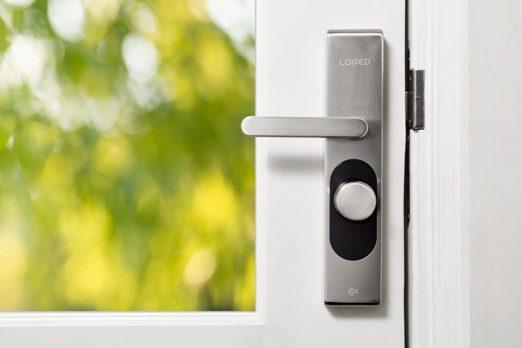 Modern keyless entry lock on the door of a managed apartment