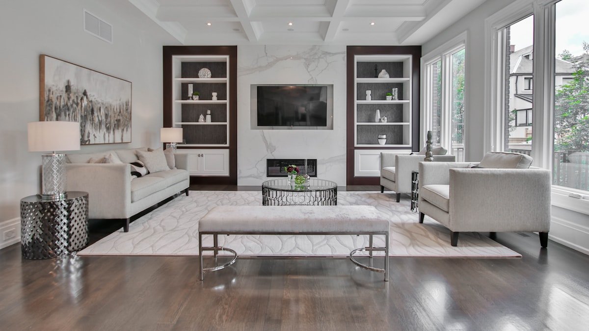 Interior of a managed condominium in Toronto's Entertainment District with the CN Tower visible through the window